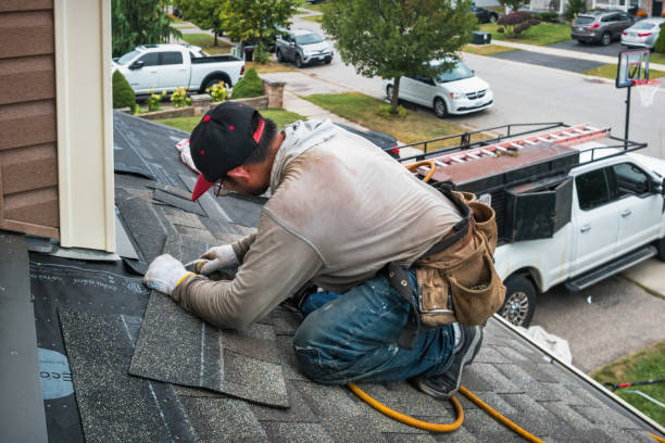 Professional Roof Replacement technician working in Hopedale, IL